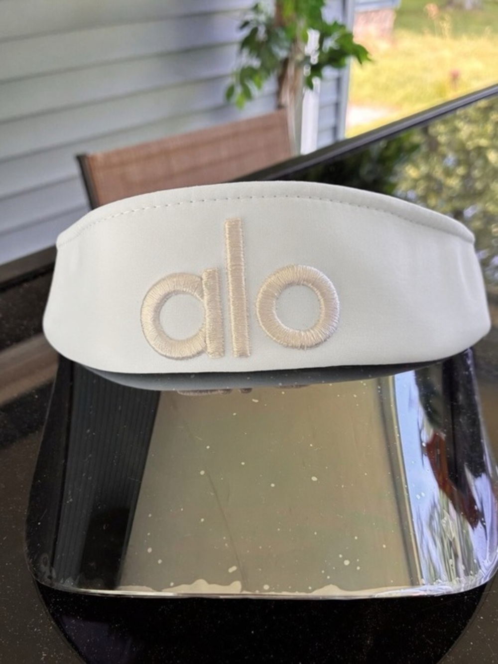 Alo White Airlift Visor -Still has protective coating on the brim